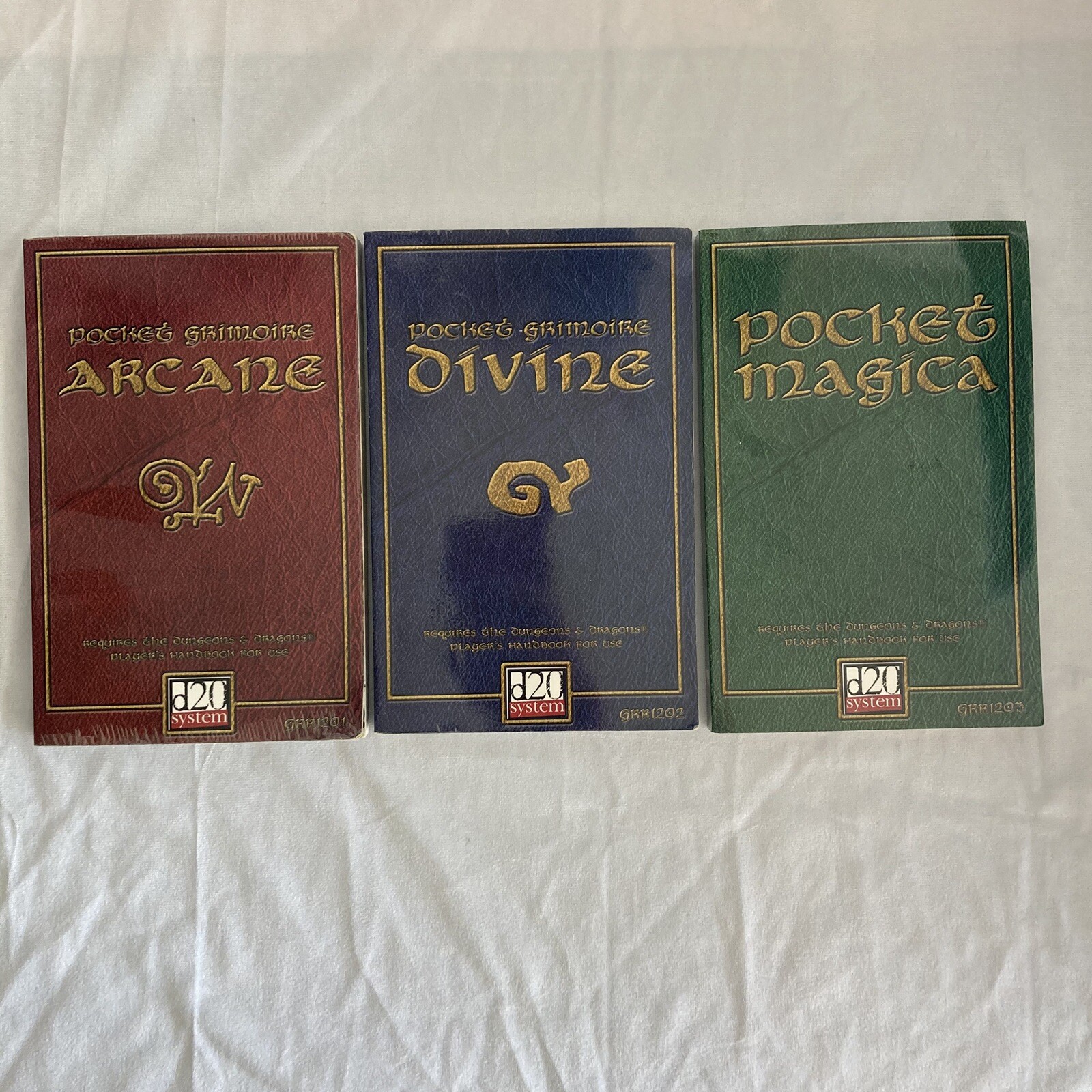 Set of 3 Books: POCKET GRIMOIRE ARCANE, DIVINE, & MAGICA d20–Dungeons & Dragons